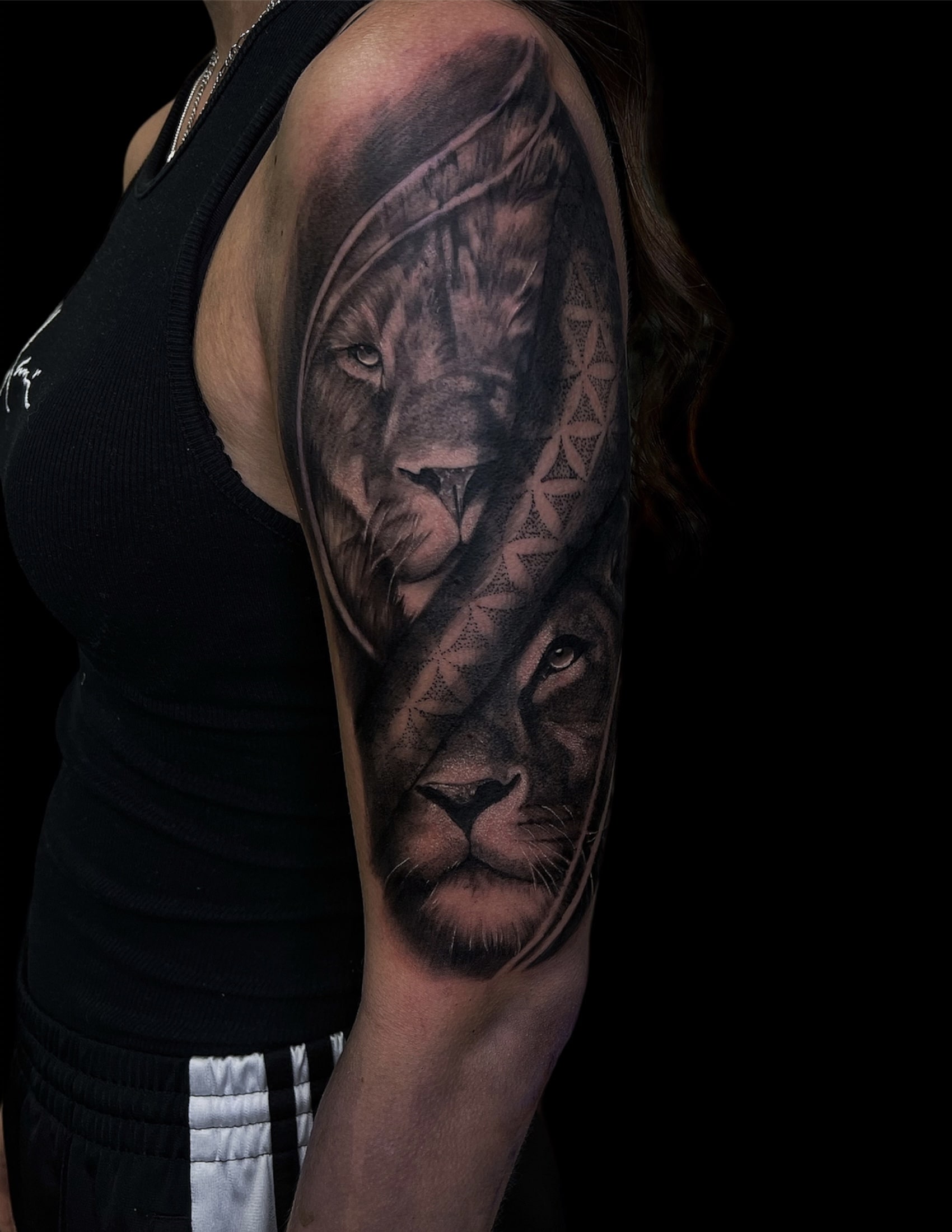 Löwen-Schlangen-Tattoo